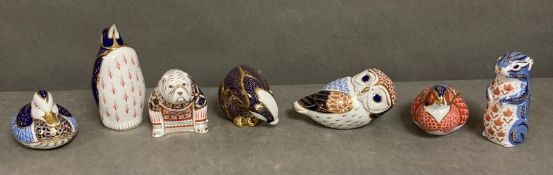 A selection of Royal Crown Derby animals to include a bull dog, duck, otter and a reclining owl.