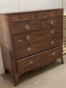A Scottish mahogany three over two over three chest of drawers with splayed legs Height 116 cm x