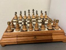 A large Italian marble topped chess board with light oak pieces