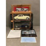 A selection of three collectable model cars to include a Franklin Mint Rolls Royce silver ghost with