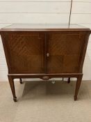 Maple and Co mahogany quartered veneered Astor cocktail cabinet (H99cm W90cm D44cm)