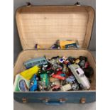 A mixed selection of vintage model cars, aeroplanes and other toy ephemera