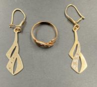 A 9ct gold ring and a pair of earrings (Approximate Total Weight 6.5g)