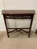 A small French style mahogany console table (H75cm W82cm D26cm)