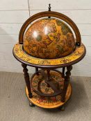 A Globe, revolving drinks stand.