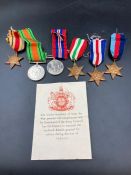 WWII Medals with original box and paperwork to include: The Africa Star with 8th Army Clasp, 1939-