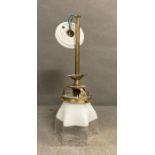 A Victorian brass ceiling light with a two tone glass shade with crimped detailing