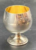 A silver goblet with gilded interior, hallmarked for Birmingham 1973 by Toye, Kenning & Spencer (