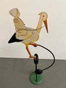 A metal novelty stork