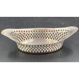 A silver pierced bowl, hallmarked for Sheffield 1932, 16 cm long (Approximate Total Weight 54g)
