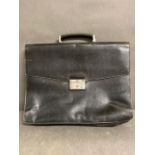 A Prada women's vintage Saffiano business bag in black calf leather.