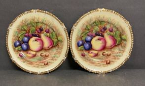 A pair of Aynsley china, cabinet plates with fruit design