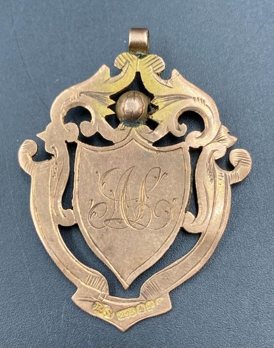 A 9ct gold shield shaped pendant with enamel elephant to center (Approximate Weight 6.4g), - Image 2 of 3