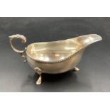 A silver sauce boat hallmarked for Birmingham 1987 by W I Broadway & Co (Approximate Total weight