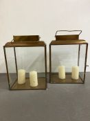 A pair of brass lanterns