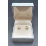 A pair of 9ct gold heart shaped earrings