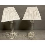 A Pair of contemporary bedside lamps