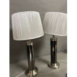 A pair of contemporary lamps