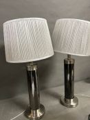 A pair of contemporary lamps