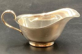 A silver sauce boat hallmarked for Sheffield 1944, by Atkin Brothers (Approximate Total weight