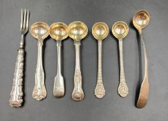 A selection of six silver salt spoons and a silver handled fork, including a Georgian spoon, various