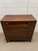 A regency mahogany four long drawer chest of drawers on splayed feet
