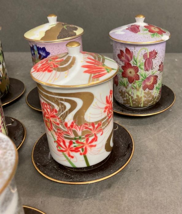 A selection of twelve floral decorated porcelain sake/tea cups and saucers - Image 5 of 5