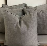 Five grey cushions with velvet trim