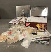 Two boxes and a bag of collectable stamps, packs etc