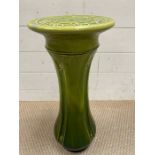 A jardinière stand decorated with green glaze and repeating pattern (H55cm)