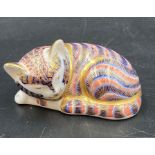 A Royal Crown Derby recumbent cat