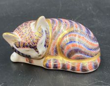 A Royal Crown Derby recumbent cat