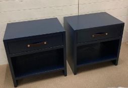 A pair of contemporary bedside tables with leather handled single drawers