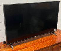 A LG flat screen TV model 43UJ630V