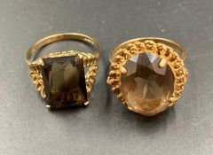 Two 9ct gold rings with smoky quartz style stones (8.4g)