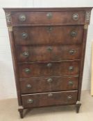 A mahogany six drawer gentleman's chest with ornate gilt topped columns to side Height 147 cm