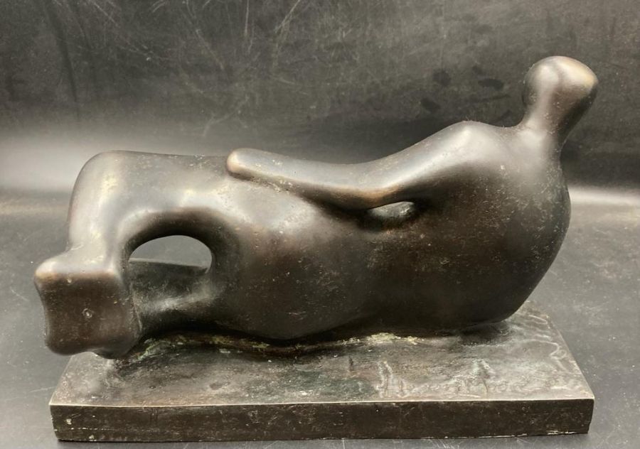 A reclining abstract bronze figure, signed Henry Moore - Image 4 of 5