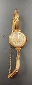 A 9ct gold ladies watch and strap (Approximate Weight 20.5g)
