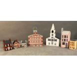 A small selection of wooden miniature houses