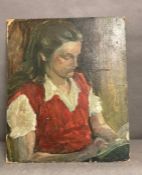 An oil on board of a girl reading