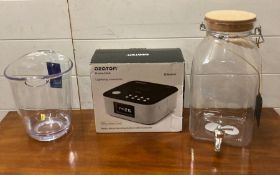 A bluetooth Azatou radio alarm clock and docking station along with water dispenser and an ice