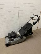 A Harrier 48 diamond power lawn mower with roller