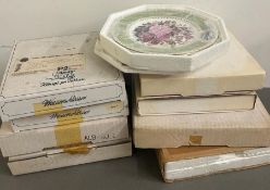 A large selection of picture plates, various makers and designs