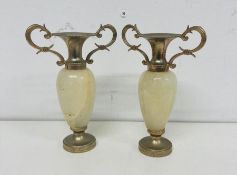 A pair of vintage miniature marble onyx candlestick holders