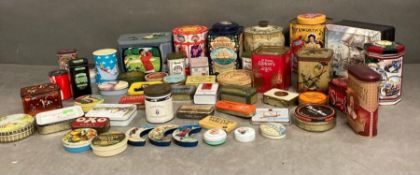 A large selection of vintage tins