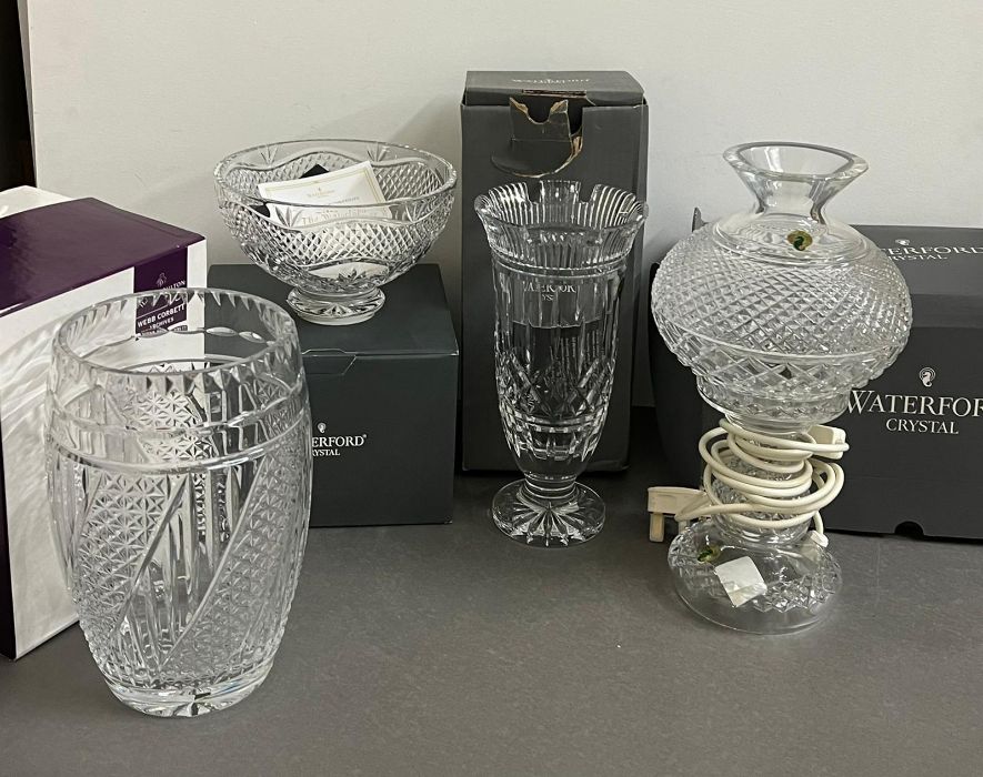 Three Waterford crystal pieces and one Royal Doulton vase