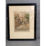 A tinted etching of a street scene signed bottom right Henry G Walker in pencil