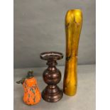 Three decorative items including vase, candle holder etc.