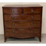 A mahogany two over three chest of drawers with brass drop handles and splayed feet (W117cm D53cm