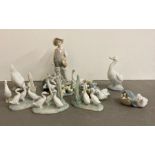 A selection of Lladro and Nao figures and birds